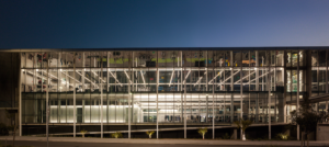 KDV Golf and Tennis Academy, front elevation viewed from the north at sundown.